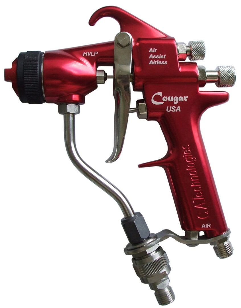 A red spray gun with the hose attached.